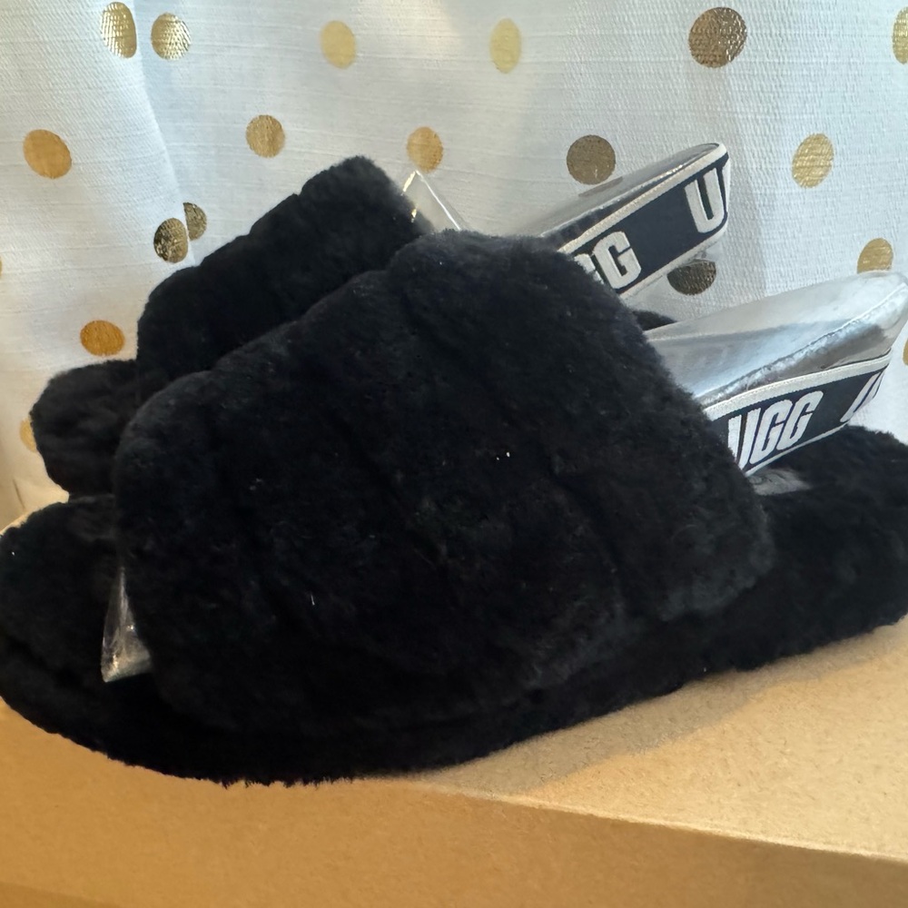ugg slippers selling for 60 or your best offer size 8 in black!